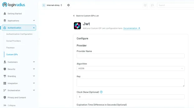 Screenshot of LoginRadius Admin Console showing JWT Custom IDP configuration interface with options for provider name, algorithm (HS256), key entry, clock skew, and expiration time settings.