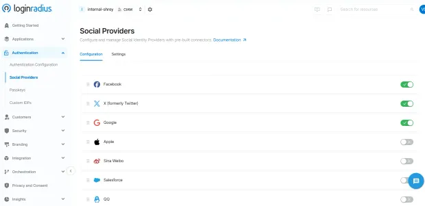 Screenshot of the LoginRadius dashboard showing the “Social Providers” configuration page. Lists enabled and disabled connectors for Facebook, X (formerly Twitter), Google, Apple, Sina Weibo, Salesforce, and QQ.