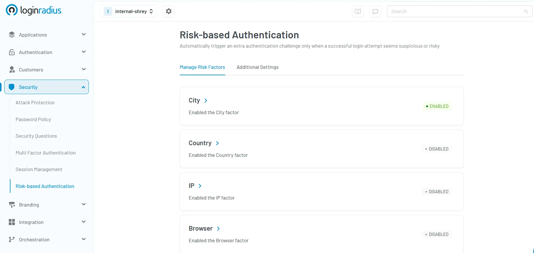 LoginRadius console showing risk-based authentication settings with enabled and disabled risk factors like city, country, IP, and browser.